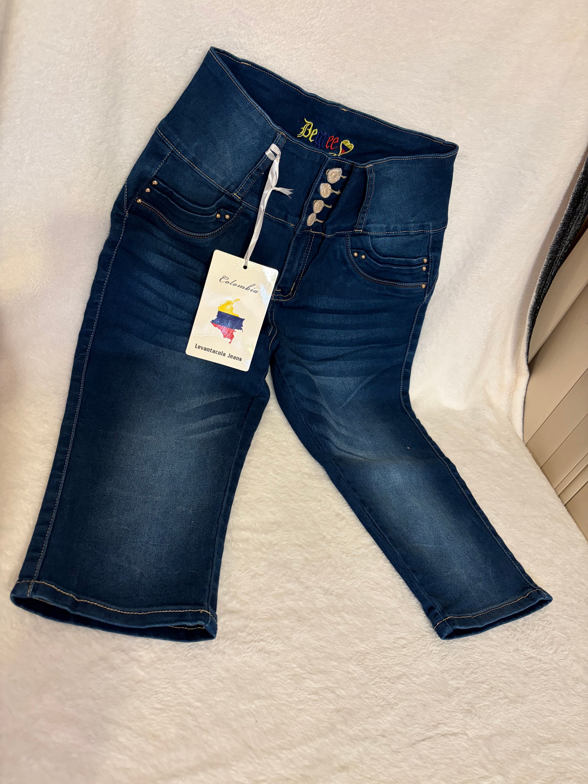 Colombian Levantacola dark navy jeans flat lay with brand tag